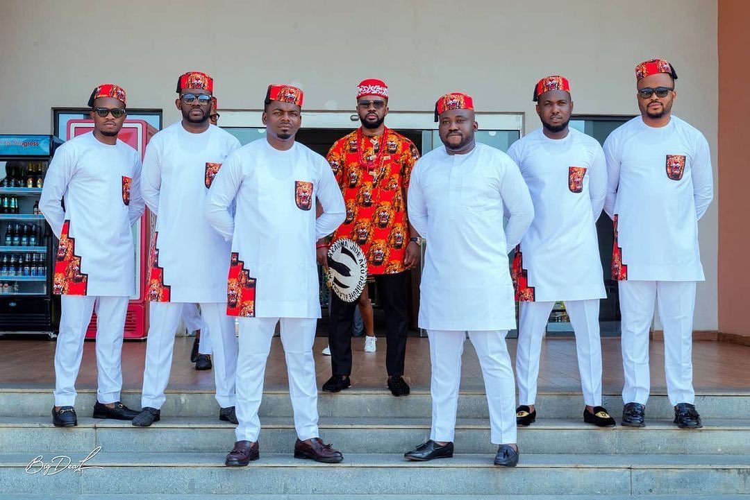 Grooms men in White 2-piece Native with a touch of Red Velvet Isiagu fabric